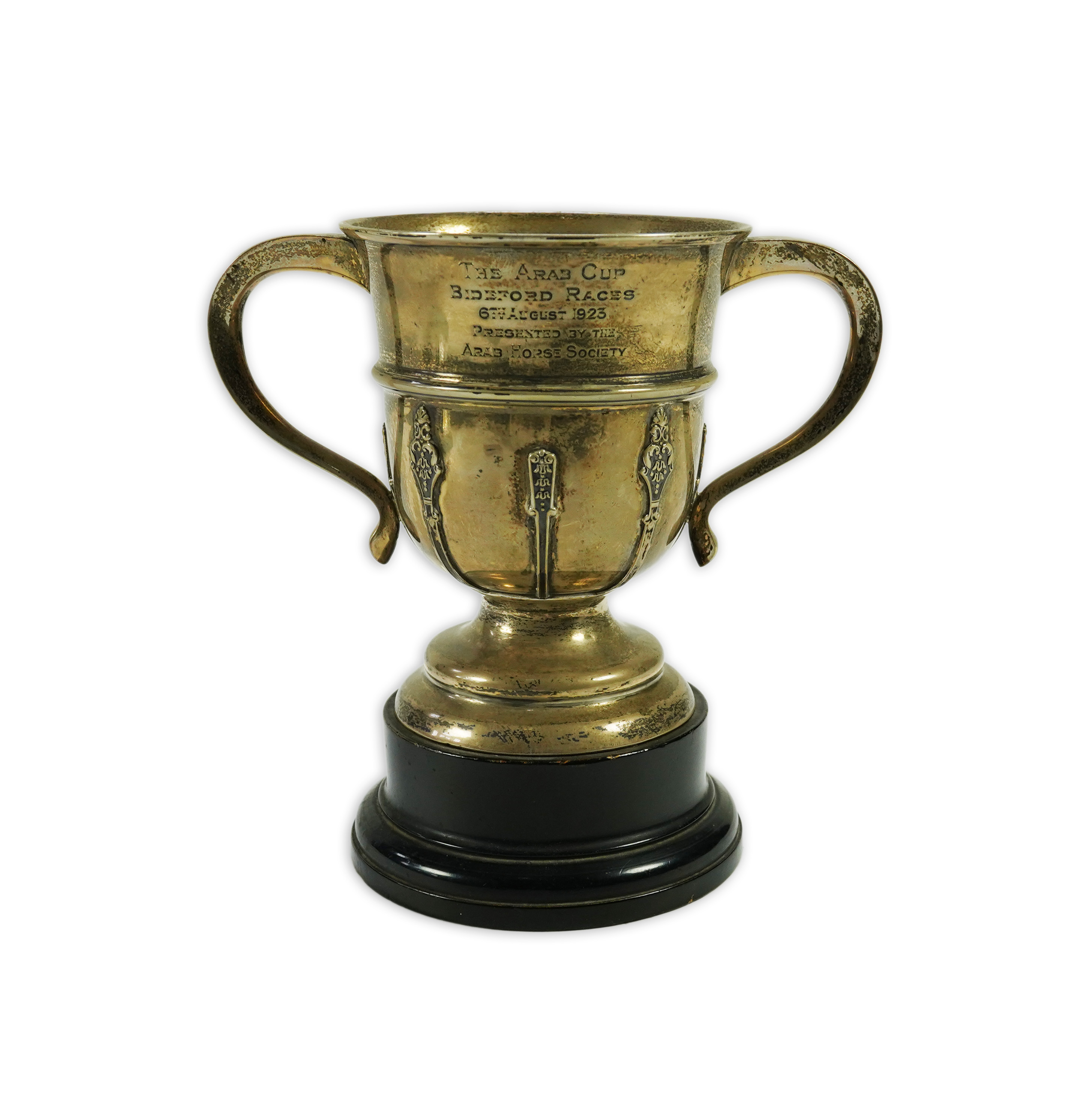 A George V silver two handled presentation trophy cup by The Goldsmiths & Silversmiths Co Ltd, with engraved horse racing inscription relating to 'The Arab Cup Bideford Races'